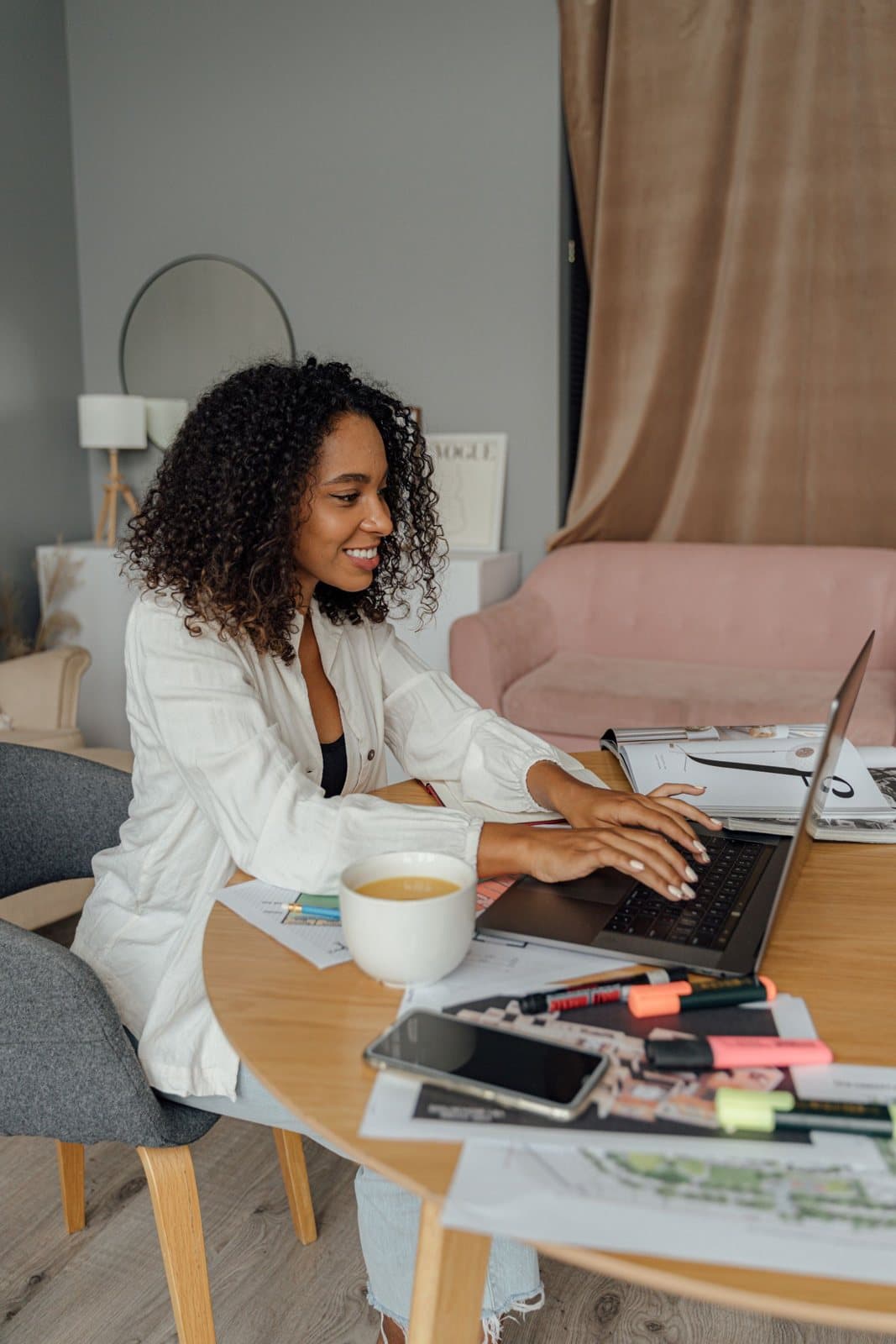 A seller running her online business from her laptop